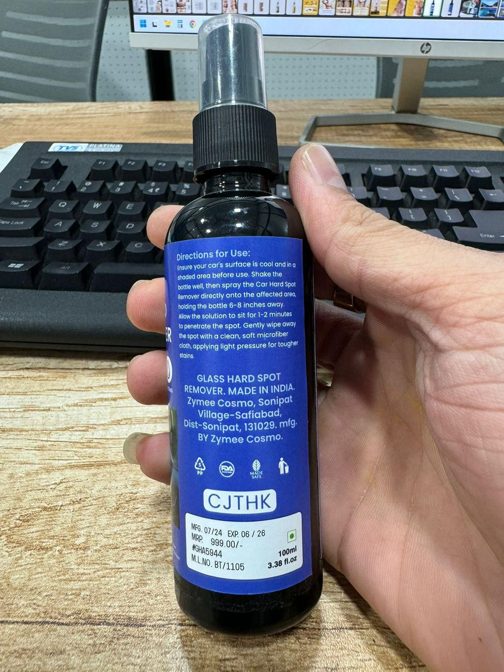 Automotive glass cleaner spray bottle for removing hard spots and ensuring clear visibility